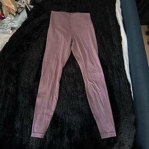 Lululemon leggings size 8 (color is a light purple/pink)